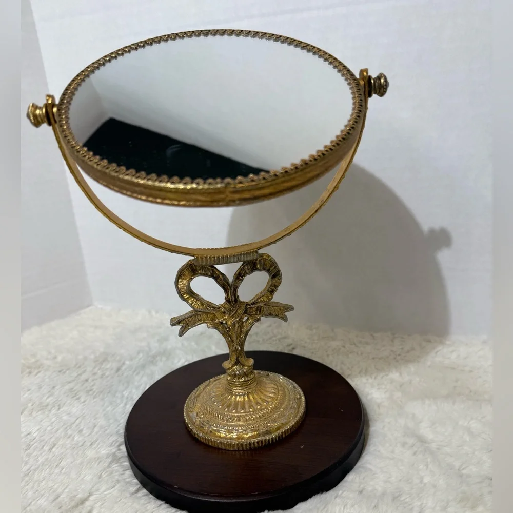 VTG Stylebuilt double sided gold-tone tilting vanity mirror with a ornate stand
